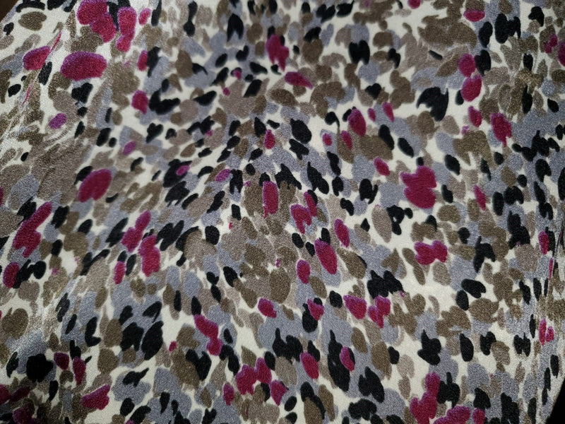 Printed maxi dress by Profile NYC featuring vibrant floral patterns and flowing fabric, perfect for summer or casual occasions.