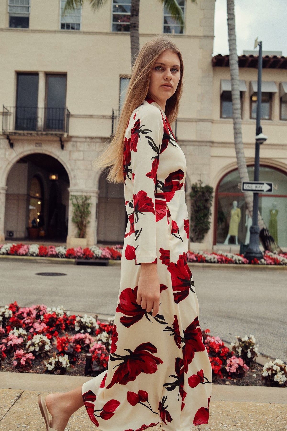 Rose faux wrap dress by profile-nyc, showcasing a stylish dress with floral pattern and elegant wrap design.