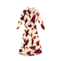 Rose faux wrap dress by profile-nyc, showcasing a stylish dress with a flattering wrap design and floral rose pattern.