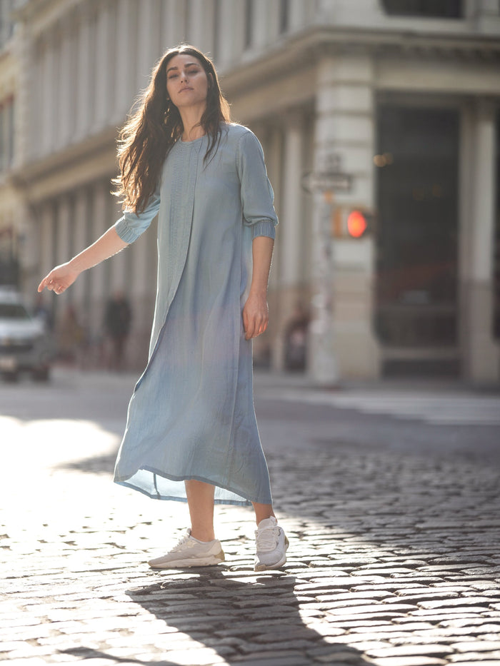 TENCEL pleat dress by profile-nyc featuring a flowing silhouette and elegant pleats, perfect for stylish occasions.