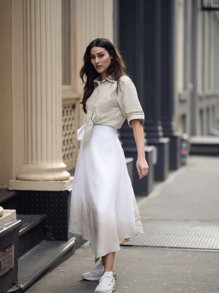 Linen ombre wrap skirt by Profile NYC, featuring a flowy design with gradient shading and adjustable wrap closure.