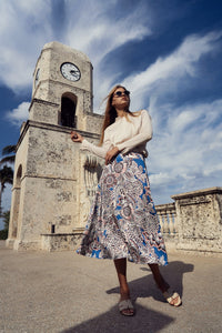 Floral printed slip skirt by Profile NYC featuring lightweight fabric and a relaxed fit, shown in a natural pose.