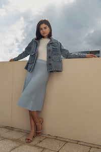 Sky blue summer seam skirt by Profile NYC, featuring a fitted design and lightweight fabric, displayed on a neutral background.