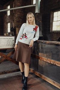 Profile NYC seam skirt with tailored design, shown in a natural pose on a plain background.