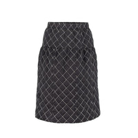 Quilted skirt by Profile NYC featuring a stylish, padded design in a versatile color, perfect for casual or chic outfits.