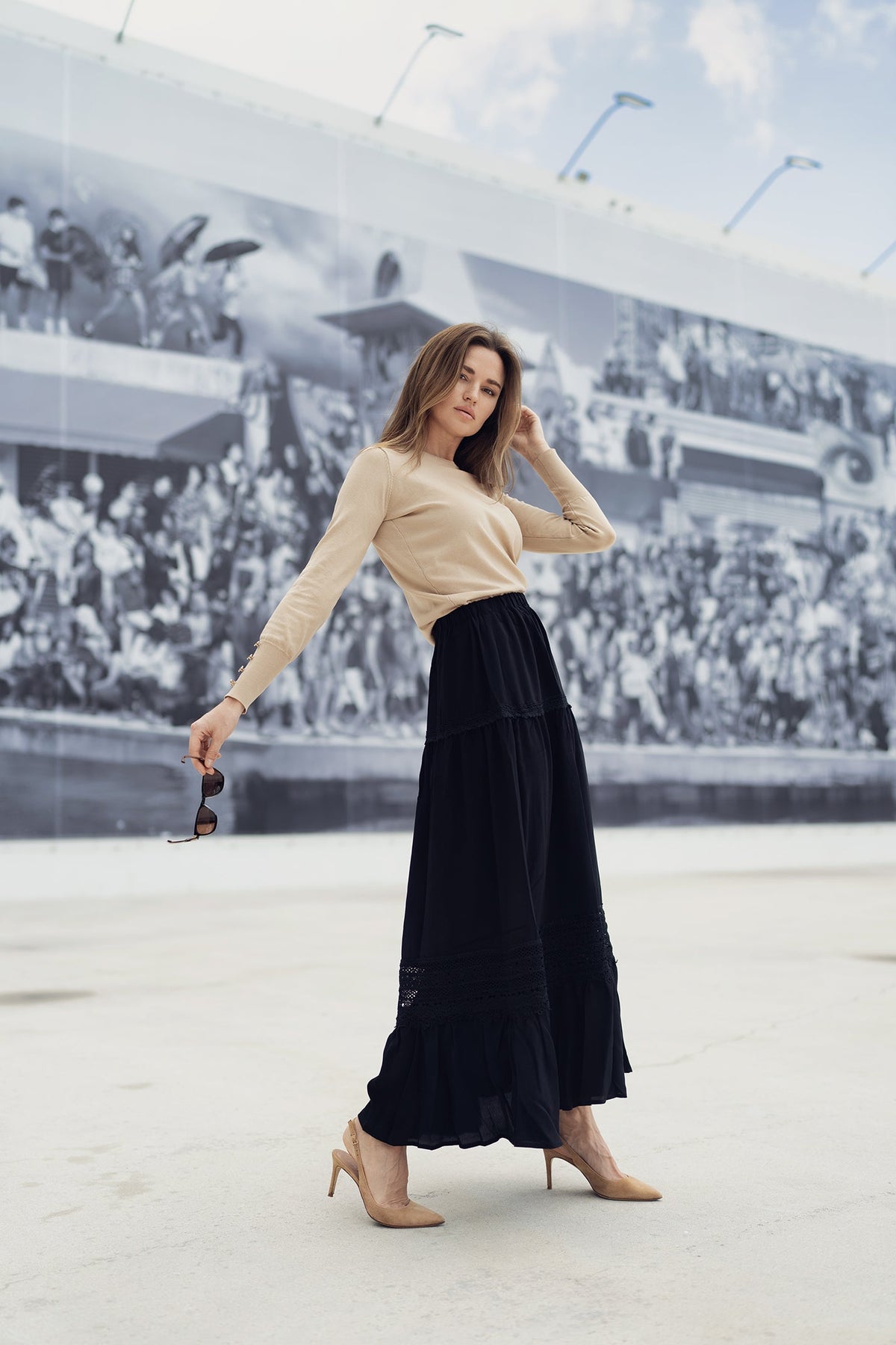 White eyelet skirt from Profile NYC, featuring a lightweight, feminine design with eyelet detailing and a flattering fit.