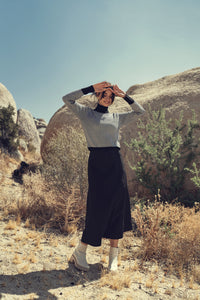 Black and white design sweater by Profile NYC featuring a stylish, modern pattern perfect for casual wear.