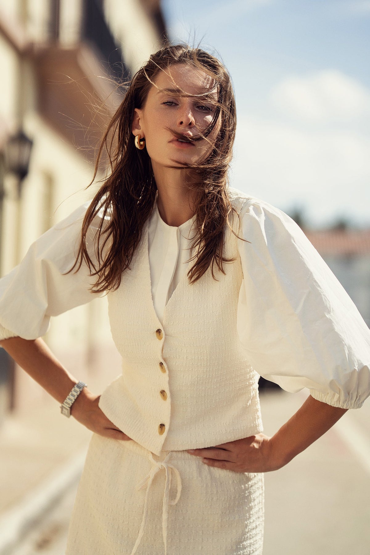 Crinkle cream vest top by Profile NYC, sleeveless with textured fabric, casual style, shown on a neutral background.