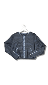 Profile NYC wool and leather jacket displayed on a hanger, featuring a stylish design with a wool body and leather sleeves.