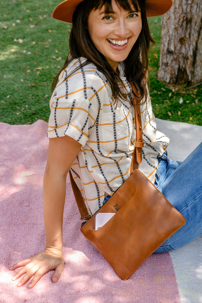 Brown Purse & Clutch simple crossbody bag with adjustable strap and minimal design, perfect for everyday use.