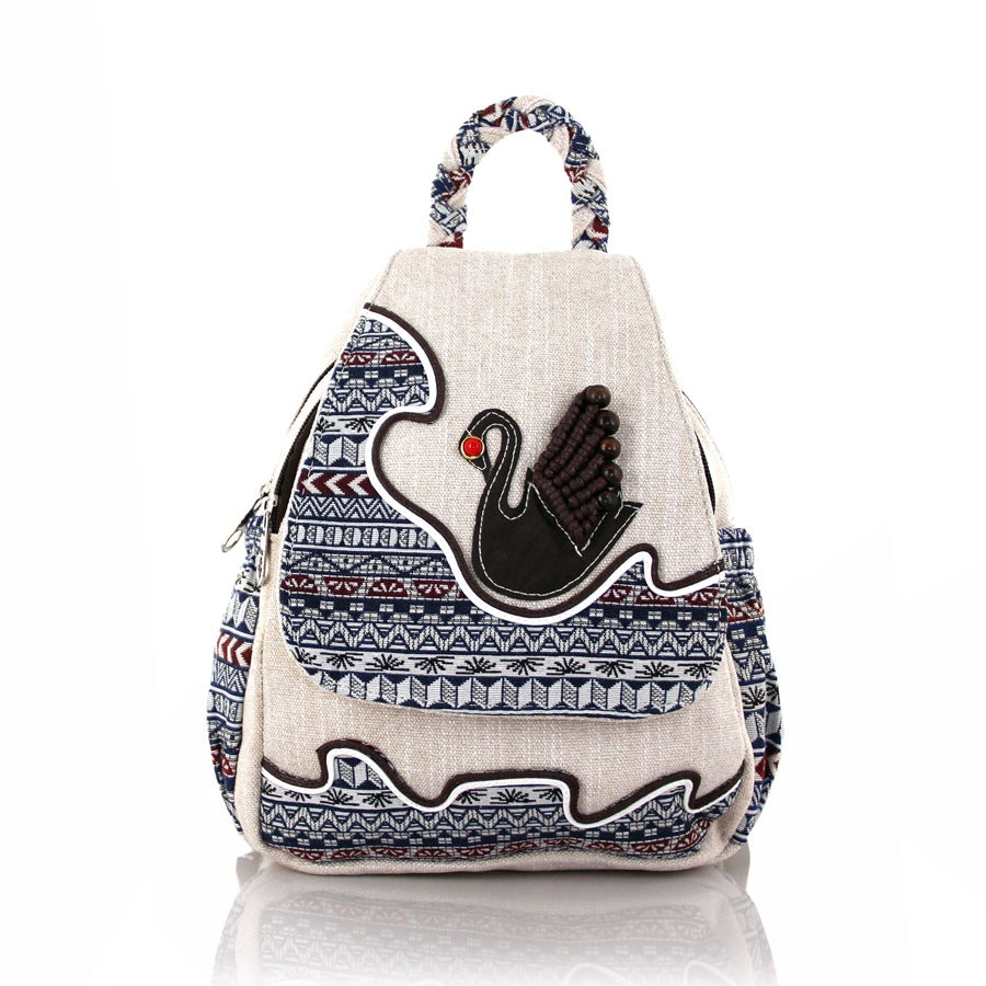 Rirati women's woven Swan design backpack with three-dimensional double bag style, featuring a fresh, stylish look.