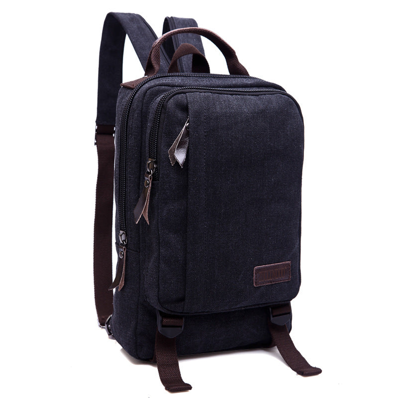 Black Rirati canvas backpacks for women and men with solid design, suitable for everyday use and optional carrying options.