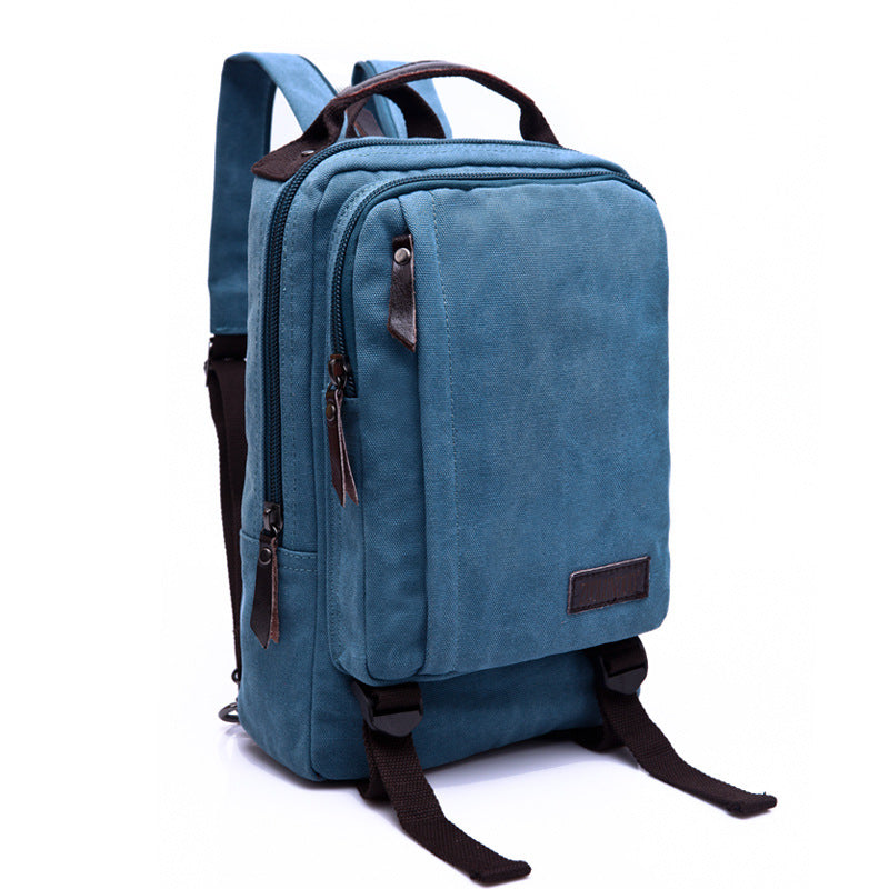 Black Rirati canvas backpack for women and men, featuring a solid design and adjustable straps for versatile use.