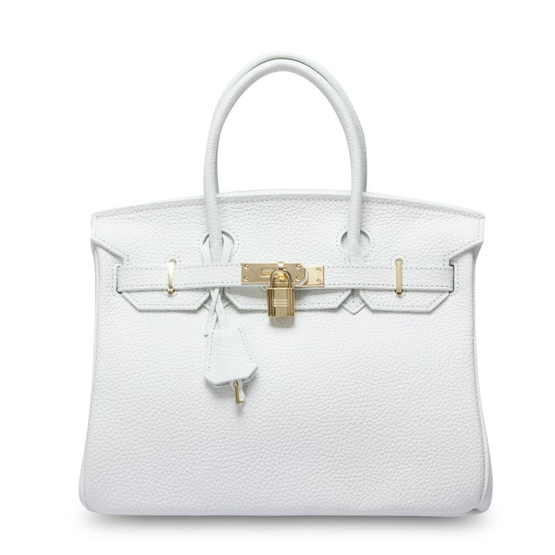 White women's leather handbag by Rirati featuring a portable, strapless design made from genuine cowhide leather.