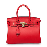 White women's leather handbag by Rirati, made from genuine cowhide, featuring a portable design and 35cm strap.