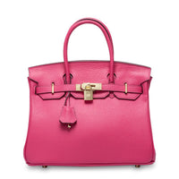 White women's leather handbag by Rirati, made from genuine cowhide, featuring a portable, strapless design and compact size.