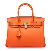 White women's leather handbag by Rirati, made from genuine cowhide, featuring a portable design and 35cm strap.