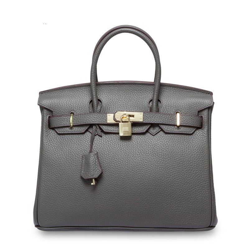 White women's first layer cowhide leather handbag by Rirati with a 35cm strap, portable and stylish for everyday use.
