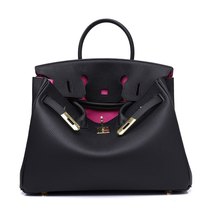 White women's Rirati genuine leather handbag with a 35cm strap, compact and portable first layer cowhide leather hand-held bag.