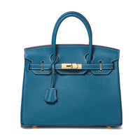 White women's leather handbag by Rirati, made from genuine cowhide, with a portable design and 35cm strapless style.