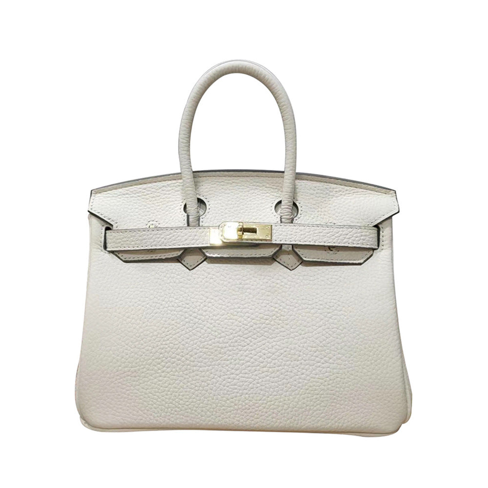 White Rirati women's leather handbag with a 35cm strap, made from genuine cowhide first-layer leather, portable and stylish.