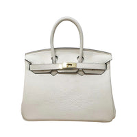 White Rirati women's leather handbag with a 35cm strap, made from genuine cowhide first-layer leather, portable and stylish.