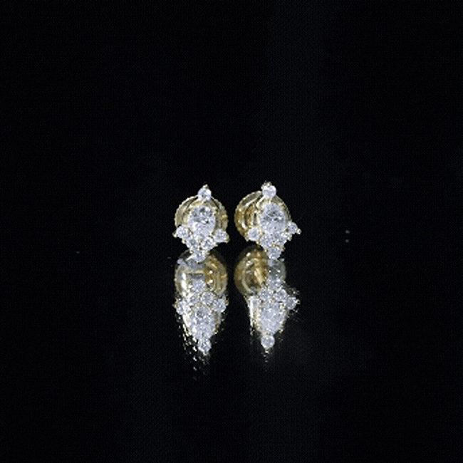 Rosec Jewels certified moissanite stud earrings in yellow gold-plated silver, showcasing sparkling gemstones on sleek, elegant earrings.