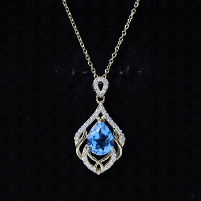 Elegant Swiss Blue Topaz pendant from Rosec Jewels featuring a 2.2 carat gemstone and lab diamond design.