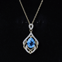 Elegant Swiss Blue Topaz pendant from Rosec Jewels featuring a 2.2 carat gemstone and lab diamond design.
