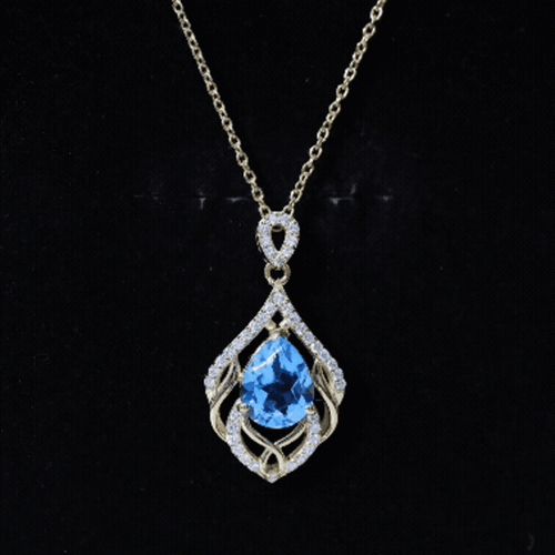Elegant Swiss Blue Topaz pendant from Rosec Jewels featuring a 2.2 carat gemstone and lab diamond design.