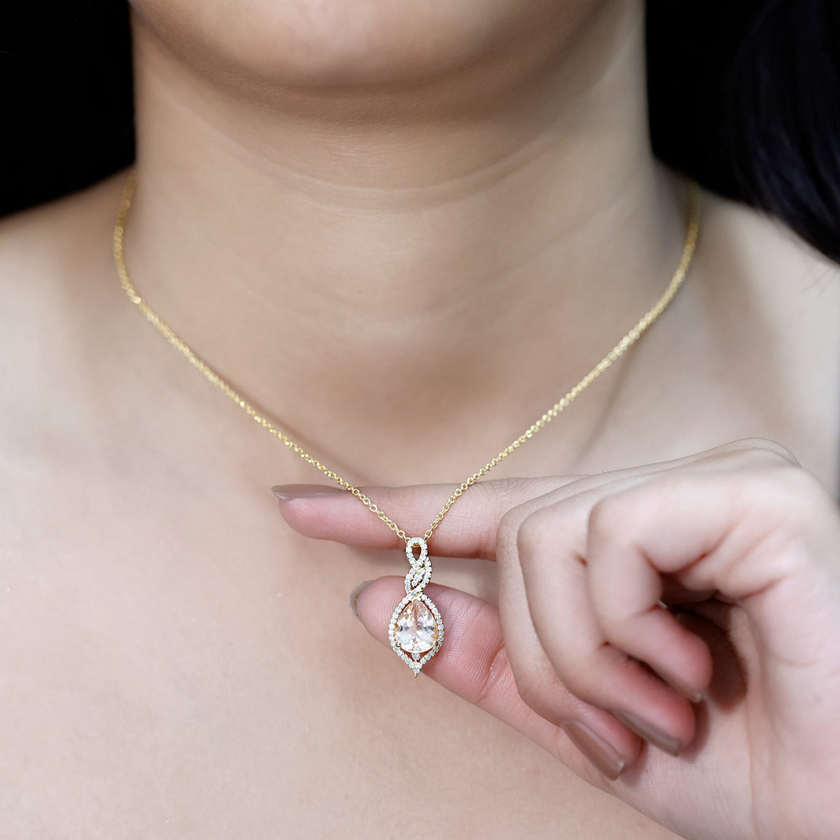 Certified 1.75 carat Morganite teardrop pendant with diamonds, showcasing elegant Rosec Jewels jewelry on a white background.