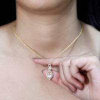 Certified 1.75 carat Morganite teardrop pendant with diamonds, showcasing elegant Rosec Jewels jewelry on a white background.