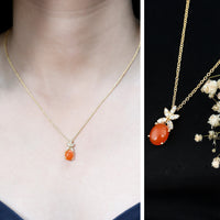 Certified 2.2 carat fire opal pendant necklace with diamond flower detail from Rosec Jewels, showcasing vibrant orange gemstone and elegant design.