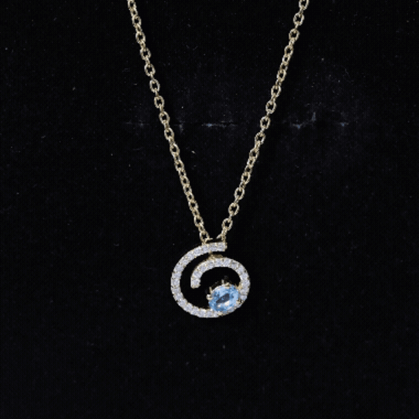 Genuine sky blue topaz and diamond swirl pendant necklace with silver chain from Rosec Jewels, showcasing a sparkling gemstone design.