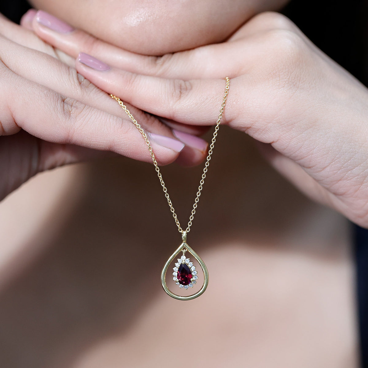 Rhodolite garnet and diamond teardrop pendant on silver chain, elegant jewelry piece from Rosec Jewels.