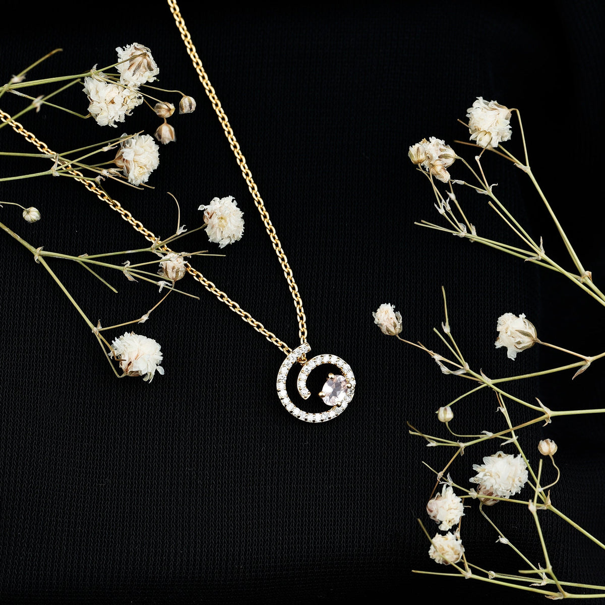 Yellow gold plated silver Morganite swirl pendant necklace with lab diamond accents, elegant jewelry piece.