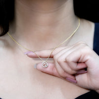 Yellow gold plated silver Morganite swirl pendant necklace with lab diamond from Rosec Jewels.