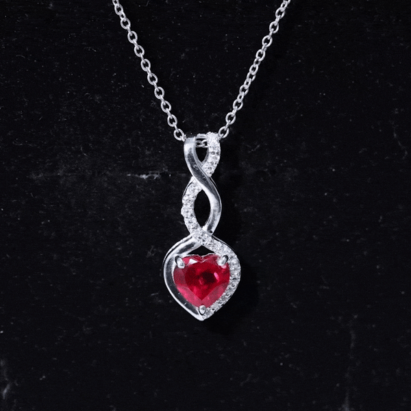 Lab grown ruby heart and infinity pendant on silver chain, 1 carat, 14k yellow gold-plated Rosec Jewels necklace.