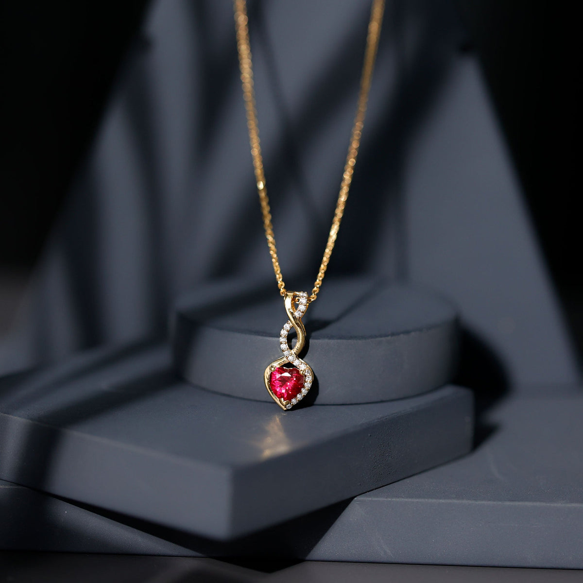 Lab grown ruby heart and infinity pendant on silver chain, 1 carat, 14k yellow gold-plated Rosec Jewels jewelry.