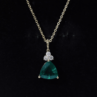 Yellow 3.5 carat trilliant cut lab-grown emerald diamond pendant with chain from Rosec Jewels, showcasing elegant jewelry design.