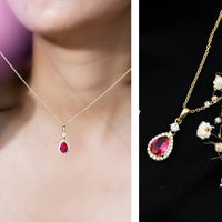 Lab-created ruby teardrop pendant with moissanite halo, featuring a delicate gold chain and elegant jewelry design.