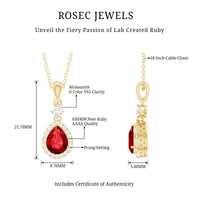 Lab-created ruby teardrop pendant with moissanite halo, featuring a delicate chain and sparkling gemstone setting.
