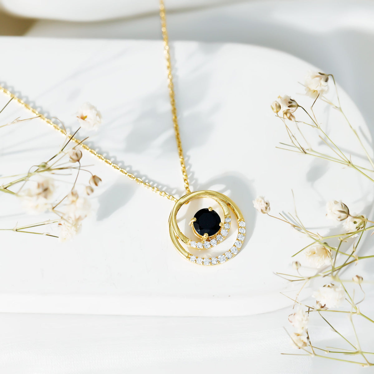 Lab created black and white diamond circle pendant on silver chain, elegant jewelry from Rosec Jewels.