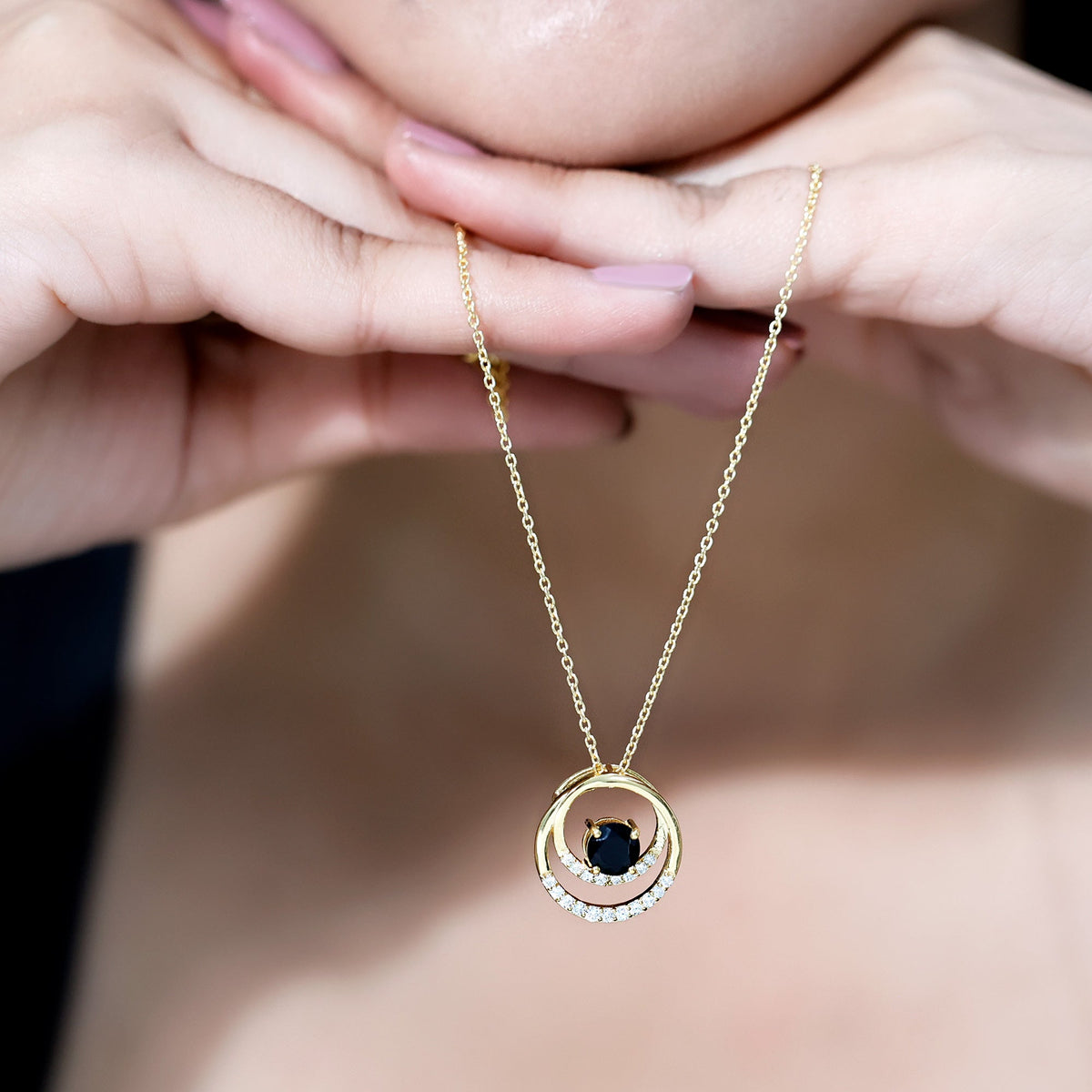 Lab-created black and white diamond circle pendant on silver chain by Rosec Jewels, close-up view showcasing sparkling stones.