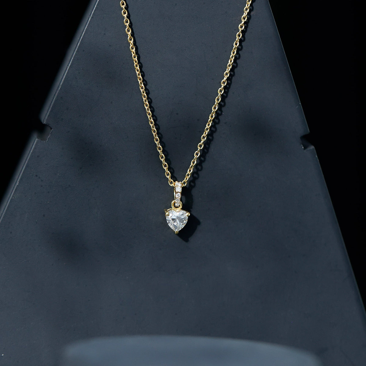 Yellow gold plated silver heart pendant with 0.5 carat moissanite, includes chain, from Rosec Jewels.
