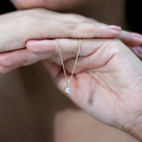 Yellow gold plated silver heart-shaped moissanite pendant with chain, 0.5 carat, from Rosec Jewels.