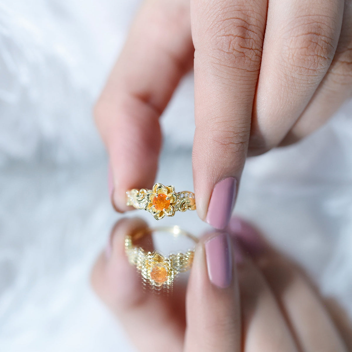 Genuine citrine rose engagement ring with sparkling diamonds by Rosec Jewels, showcasing a detailed gold band and vibrant gemstone.