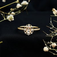Vintage-inspired Morganite engagement ring with diamonds, featuring rose gold setting and intricate design by Rosec Jewels.