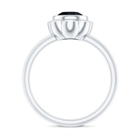 Black onyx bezel set engagement ring by Rosec Jewels featuring a 1.2 carat oval black onyx gemstone in a sleek silver band