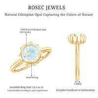 Ethiopian opal engagement ring for women with 1.5 carats, set in a silver band, from Rosec Jewels.